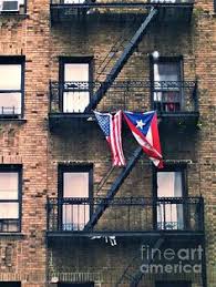 A Puerto Rican Flag and American Flag Side-by-Side